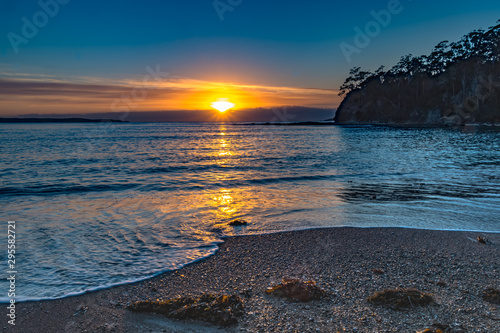 Colourful Streaky Clouds Sunrise Seascape photo