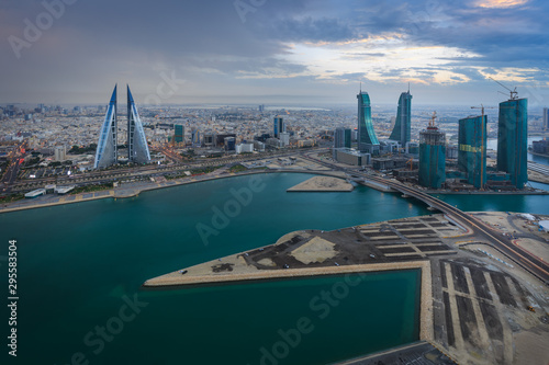 Aerial view of bahrain skyline and newly constructed areas with beautiful clouds in Manama, Bahrain	 photo