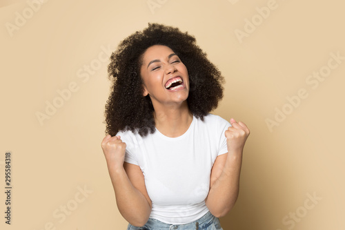 Overjoyed african American girl feel euphoric with news