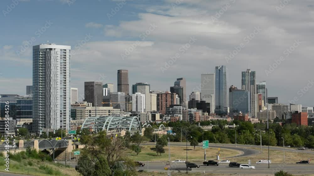 Downtown Denver, Colorado Skyscrapers with Confluence Park and the Speer Blvd. Platte River Bridges in the Foreground Downtown Denver, Colorado Skyscrapers with Confluence Park and the Speer Blvd. Platte River Bridges in the Foreground