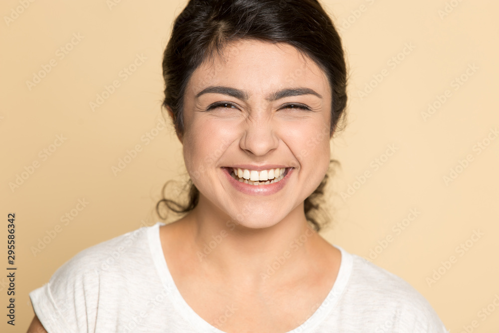Portrait of smiling indian girl laughing in studio Portrait of smiling indian girl laughing in studio