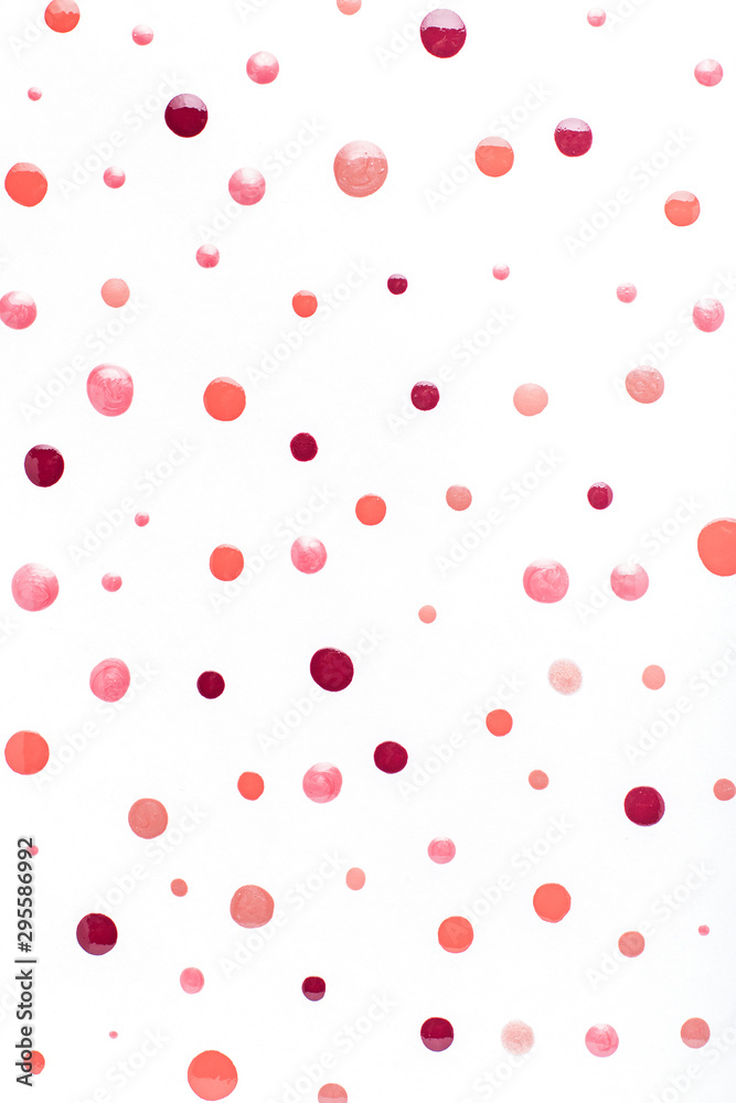 Nail polish drops pattern background in nude pink, peach, red colors. Abstract paint circles background for beauty and fashion, copy space Nail polish drops pattern background in nude pink, peach, red colors. Abstract paint circles background for beauty and fashion, copy space