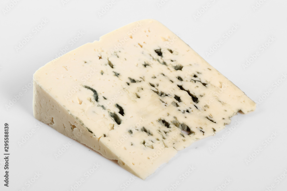 Blue cheese. Isolated on gray background. Blue cheese. Isolated on gray background.