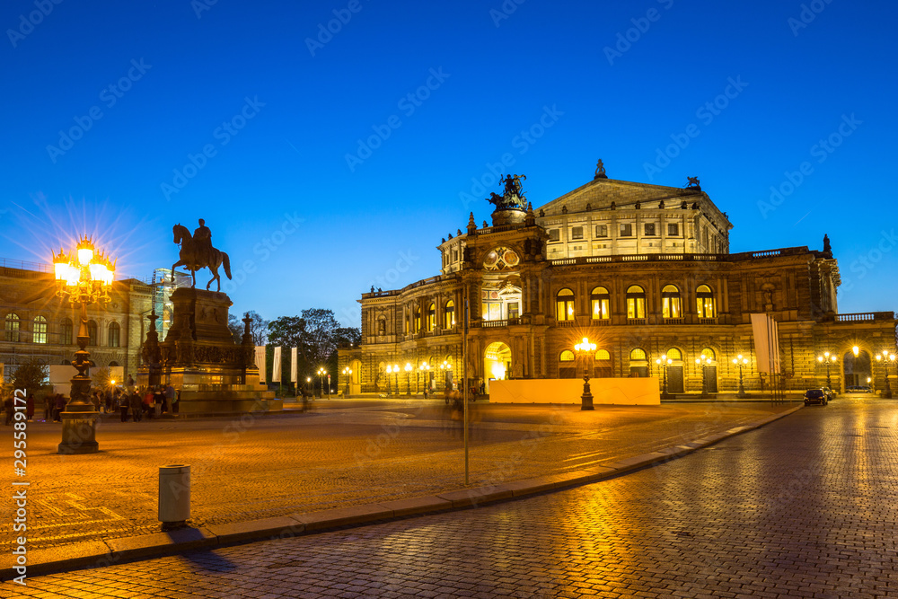 Semperoper Opera and  King John of Saxony monument at dusk, Dresden. Germany
