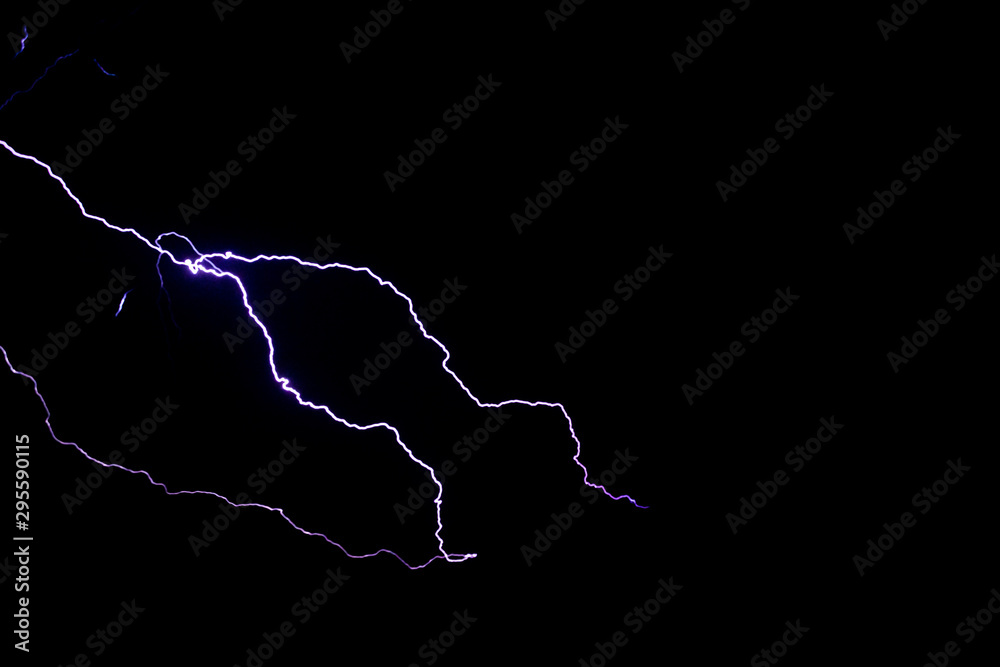 Lightning stretches out across a black sky