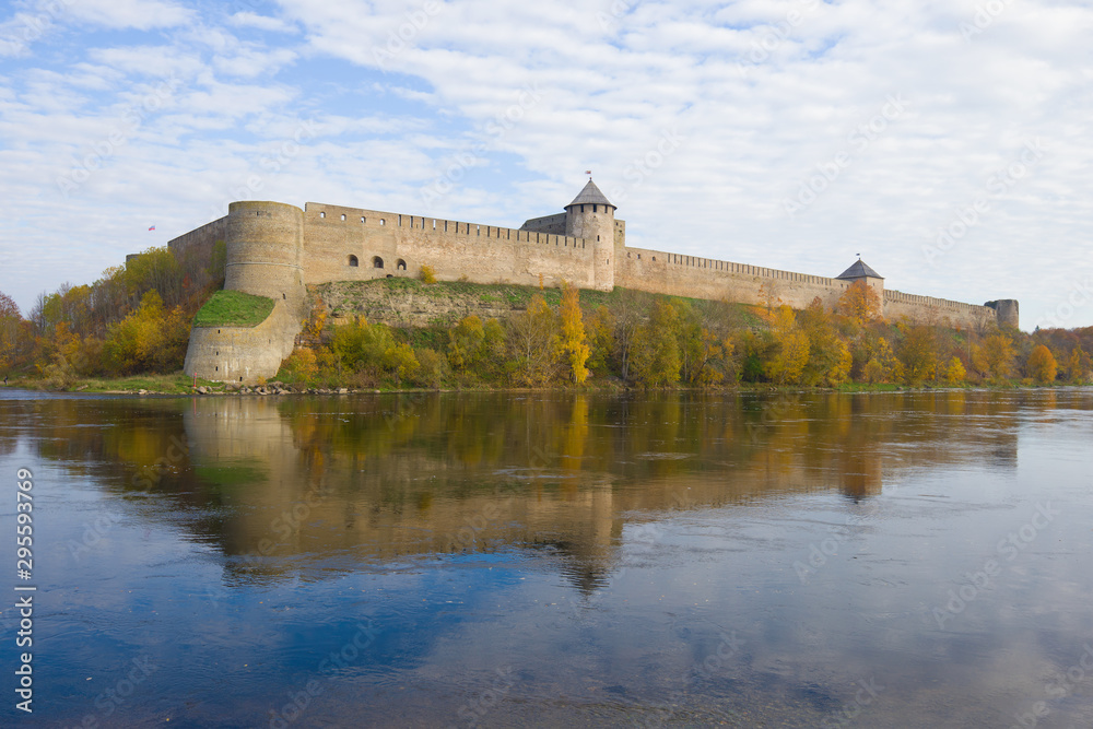View of the ancient Ivangorod fortress in golden autumn. Ivangorod, Russia