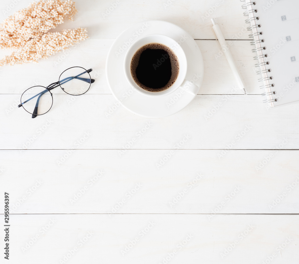 top view of office desk table with coffee cup and notebook on white background, graphic designer, Creative Designer concept. top view of office desk table with coffee cup and notebook on white background, graphic designer, Creative Designer concept.