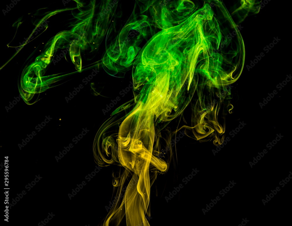 Obraz premium Colored smoke on black background