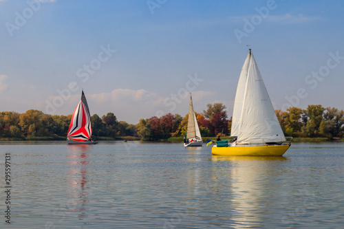 Yachts at sailing regatta on the Dnieper river in Kremenchug, Ukraine