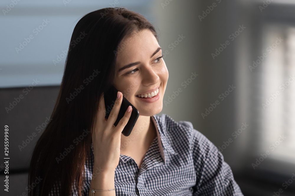 Head shot close up young happy woman holding call with partners. Head shot close up young happy woman holding call with partners.