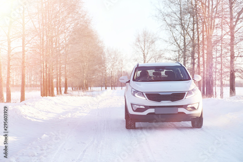 Car on a winter snow road