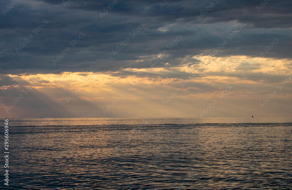 Black Sea on a warm summer evening with boats on the horizon Black Sea on a warm summer evening with boats on the horizon