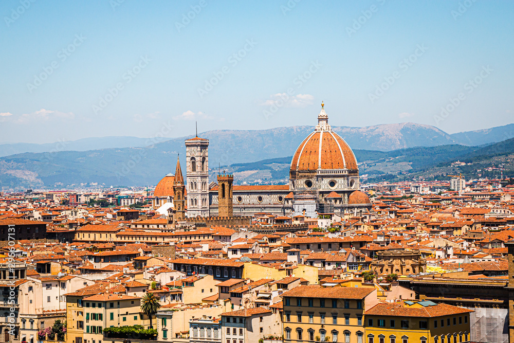 Fototapeta premium Skyline view of the city of Florence on a bright summer day in Italy with the Santa Maria Novella in the middle.