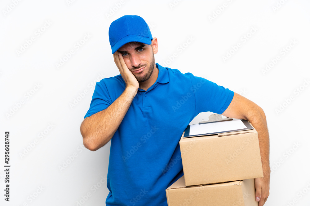 Delivery man over isolated white background unhappy and frustrated Delivery man over isolated white background unhappy and frustrated