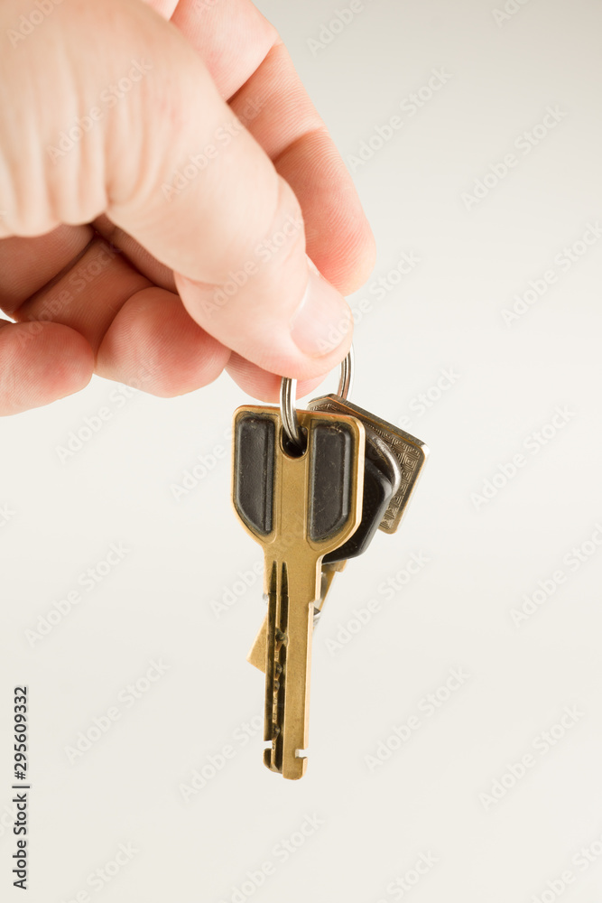 big bunch of different keys in hand big bunch of different keys in hand