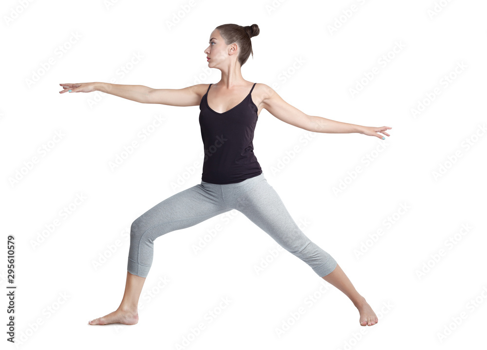 Young girl doing yoga on a white background