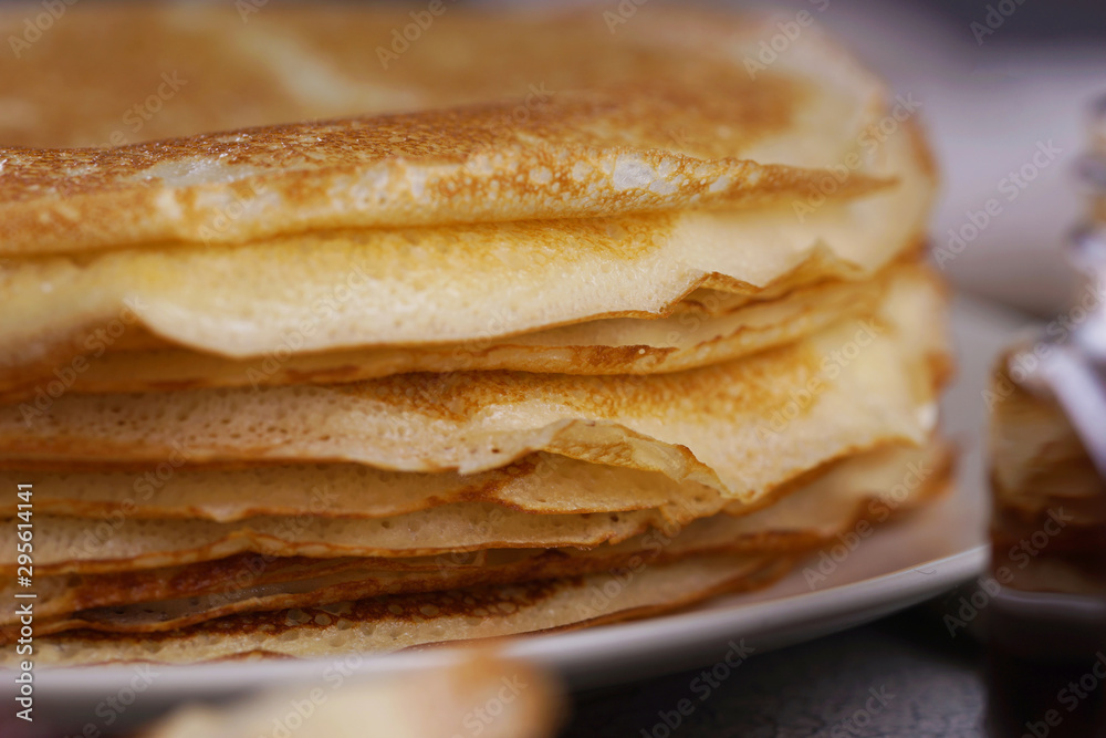 Breakfast with pancakes on a textured background