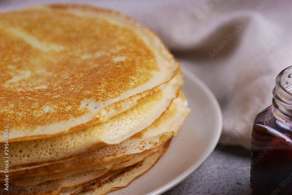 Breakfast with pancakes on a textured background Breakfast with pancakes on a textured background