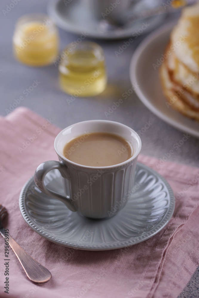 Breakfast with pancakes on a textured background Breakfast with pancakes on a textured background