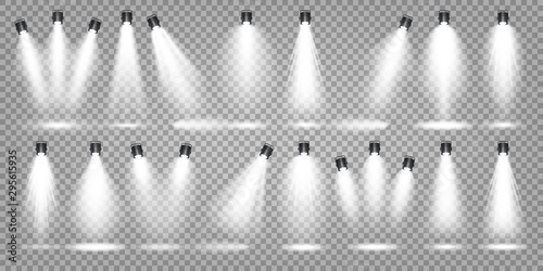 Vector spotlight set. Bright light beam. Transparent realistic effect. Stage lighting. Illuminated studio spotlights.