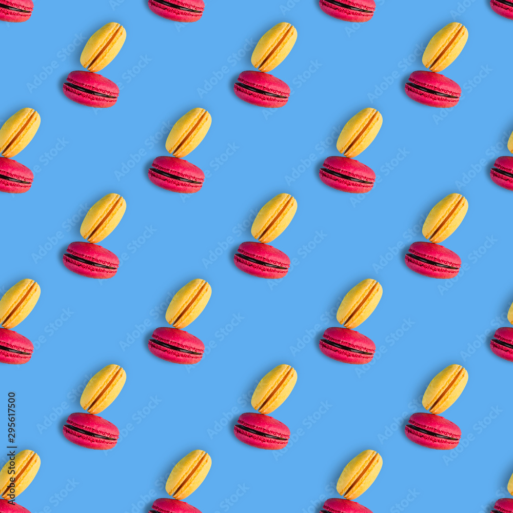 seamless pattern of macaroons on a blue background seamless pattern of macaroons on a blue background