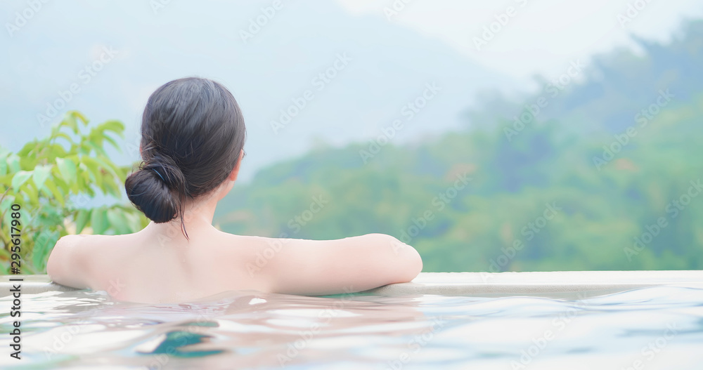 asian woman enjoy hot spring
