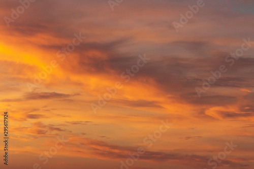 Colorful dramatic sky at sunset with pasted clouds