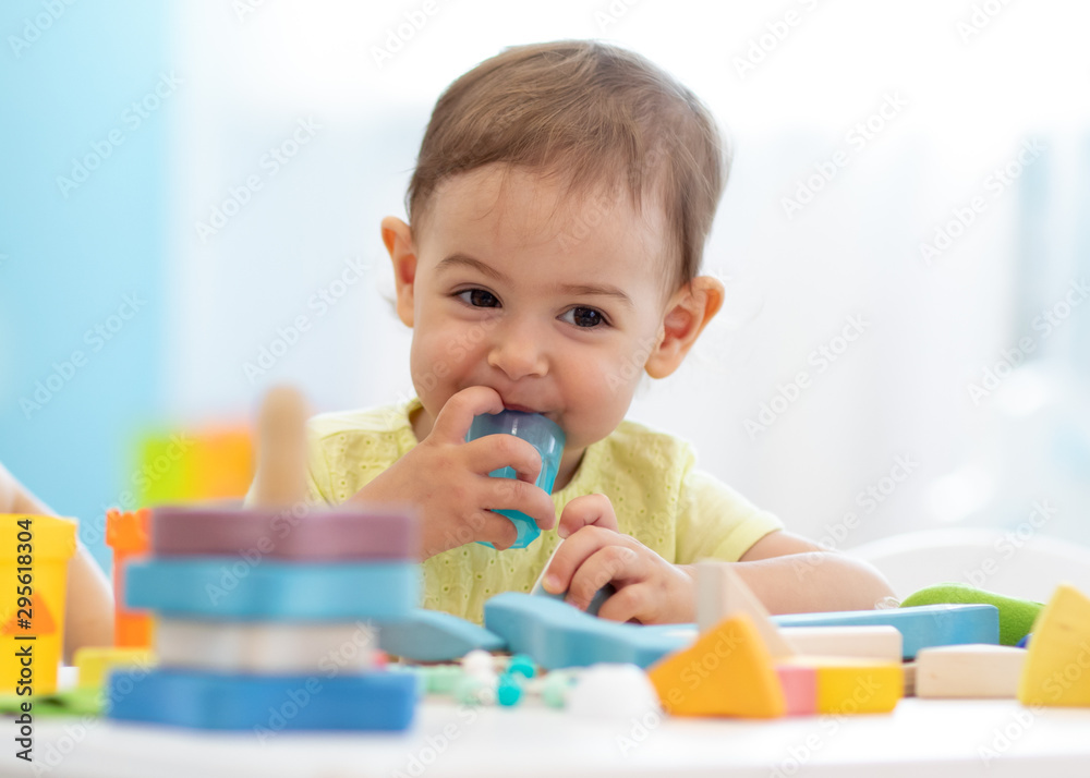 Baby toddler playing with stacking learning toys Baby toddler playing with stacking learning toys