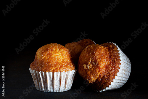 HOMEMADE MUFFIN ON BLACK BACKGROUND