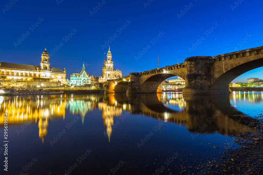 Cityscape of Dresden at Elbe River and Augustus Bridge at night, Saxony. Germany