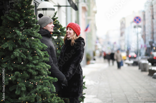 Photography Young couple walking through the winter