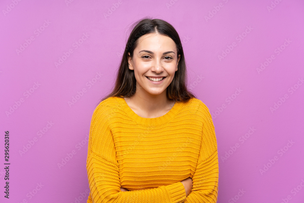Young woman over isolated purple background laughing Young woman over isolated purple background laughing