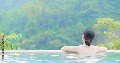 asian woman enjoy hot spring