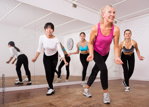 Photography Ordinary active females exercising dance moves