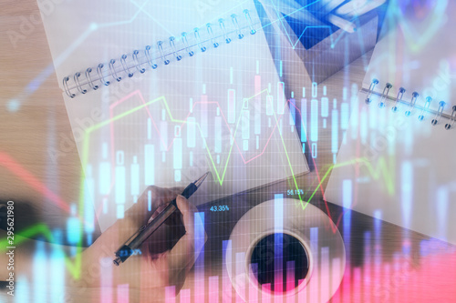 Wallpaper Mural Multi exposure of hands making notes with forex chart huds. Stock market concept. Torontodigital.ca