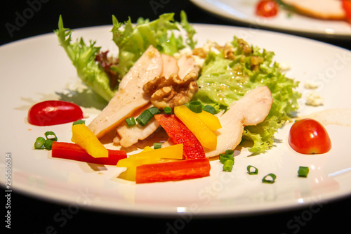 A slice chicken salad on plate