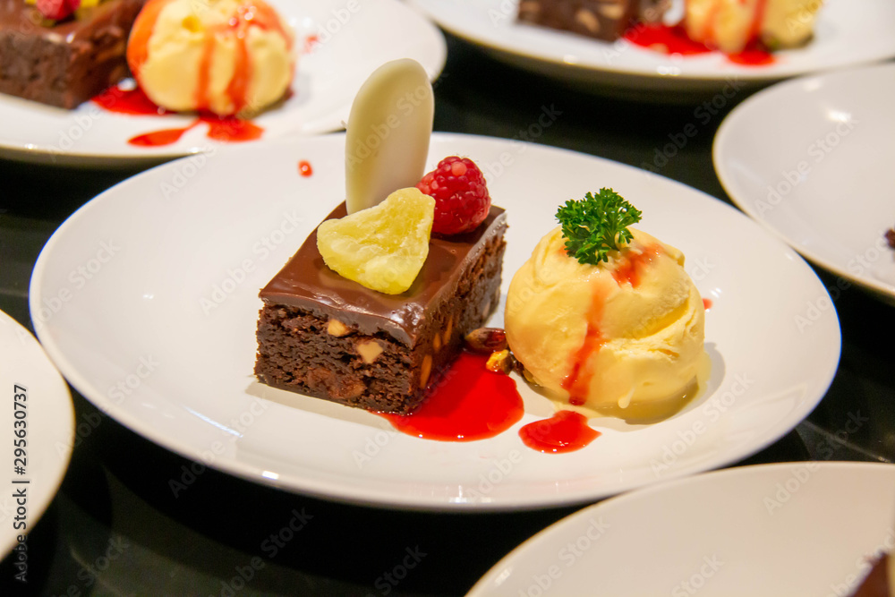 A cake and ice cream dessert on plate A cake and ice cream dessert on plate