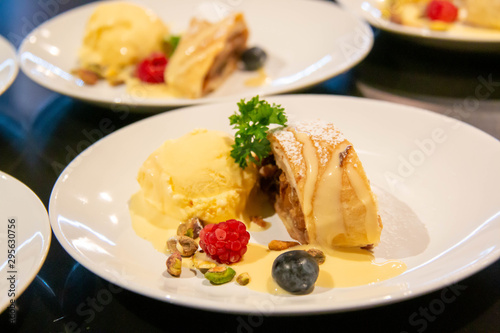 A cake and ice cream dessert on plate