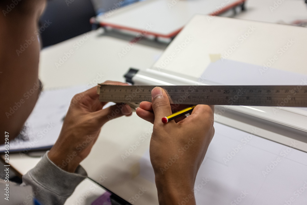 University or College Student Studying and Working in an Open Plan Classroom Work Space. - Image University or College Student Studying and Working in an Open Plan Classroom Work Space. - Image