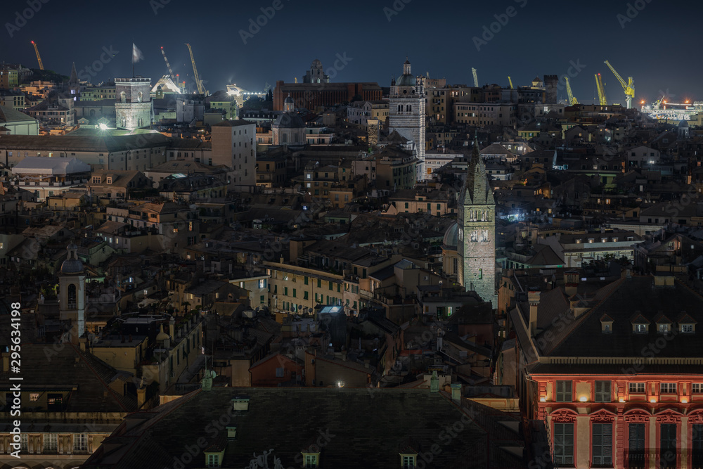 Genoa, Italy. Aerial night view of the old town of medieval origin. It is the most extensive ancient historical center of Europe