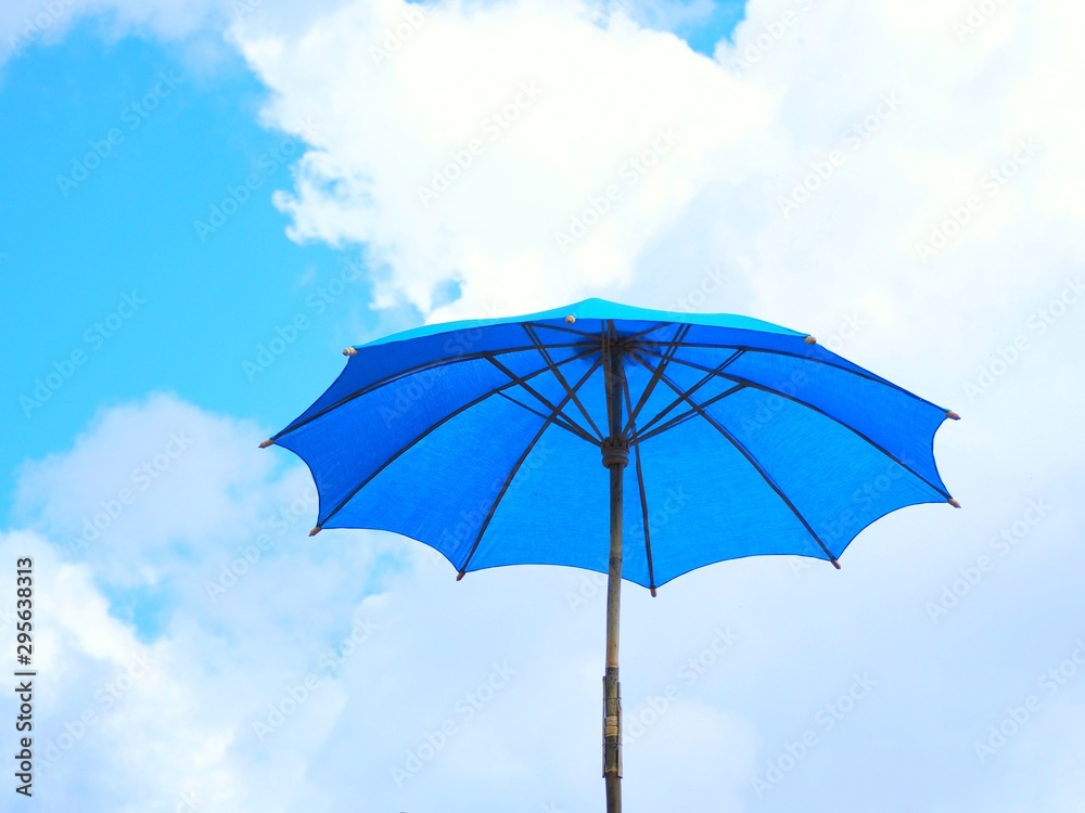blue umbrella on white background