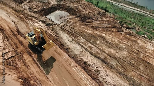 Concept of digging in some part of the soil in order to fill some soil in the area To be used to build a house
