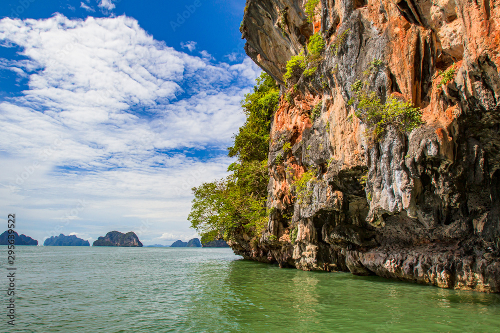 Boat trips in Thailand. Phuket Island. Cruise around the Islands. Cliff. Nature Of Thailand. Vacation in Phuket. Rocky Islands in the Andaman sea. Rocks in Phang nga Bay.