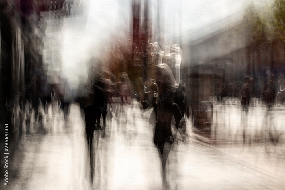 Street abstract - long exposure of people on the high street - intentional camera shake to introduce an impressionistic effect and light trails