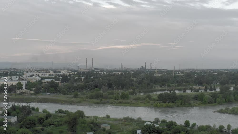 Factory Pipes in Georgia City drone slowmotion Residential buildings in Rustavi. Old soviet block of flats concrete building living houses Factory Pipes in Georgia City drone slowmotion Residential buildings in Rustavi. Old soviet block of flats concrete building living houses