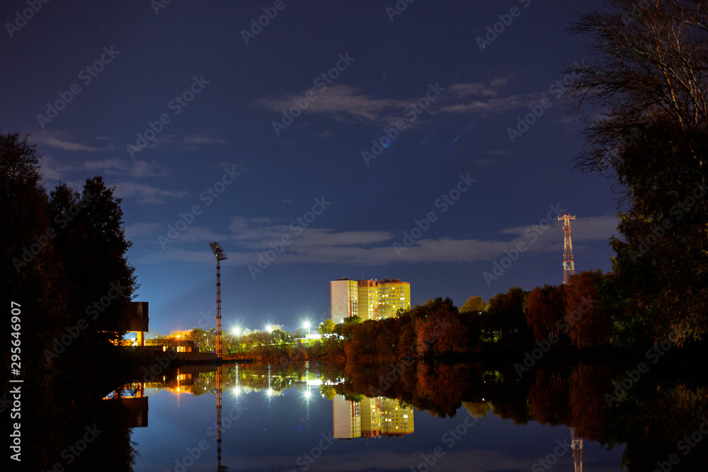 Naklejka premium lake surrounded by autumn trees