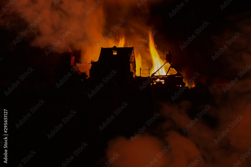 Fire and smoke form a burning building on bonfire night