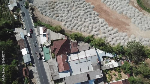 Aerial view of Traffic on Cokroaminoto Road in Semarang Regency, Java, Indonesia, Drone TOP DOWN photo