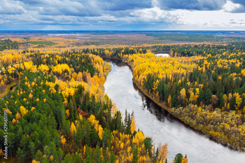 Colorful autumn landscape. Aerial photography of landscape in Western Siberia. Agan River, tributary of Ob River. photo