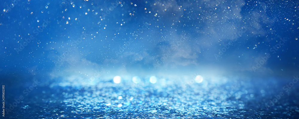 Fototapeta premium abstract glitter silver, gold , blue lights background. de-focused. banner